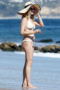 <p>Heather Graham gets her feet wet at the beach in Malibu on Monday.</p>