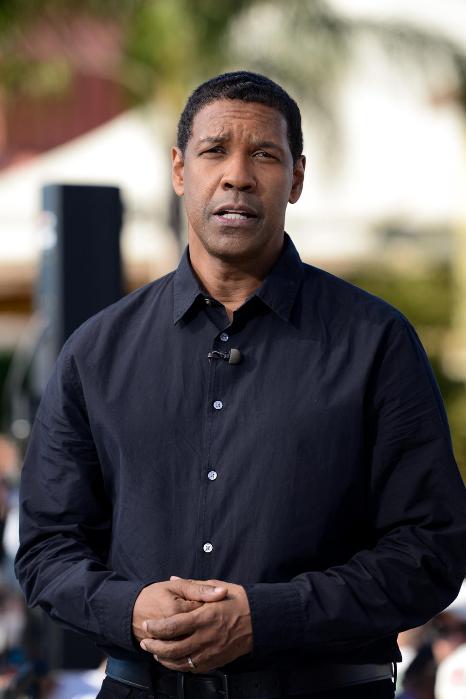 Close-up of Denzel wearing a long-sleeved shirt