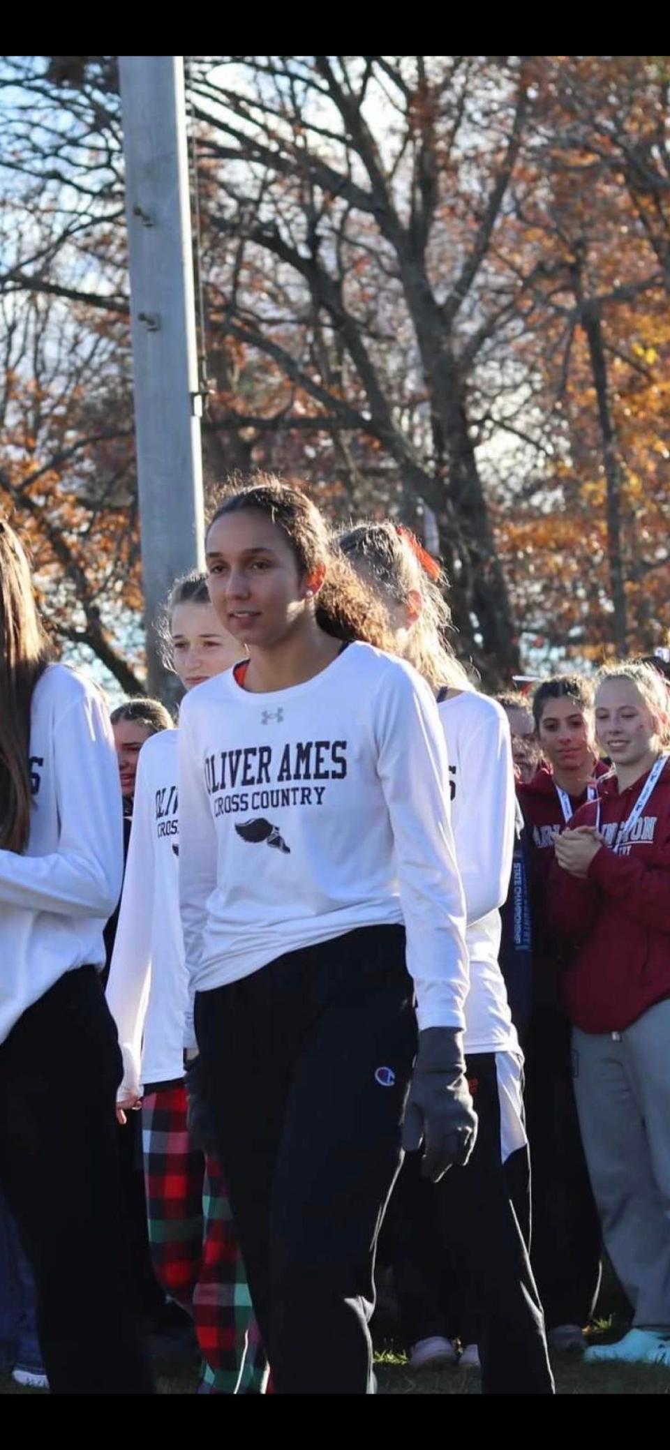 Iole Apostoli of Oliver Ames has been named to The Patriot Ledger/Enterprise All-Scholastic Girls Cross Country Team.