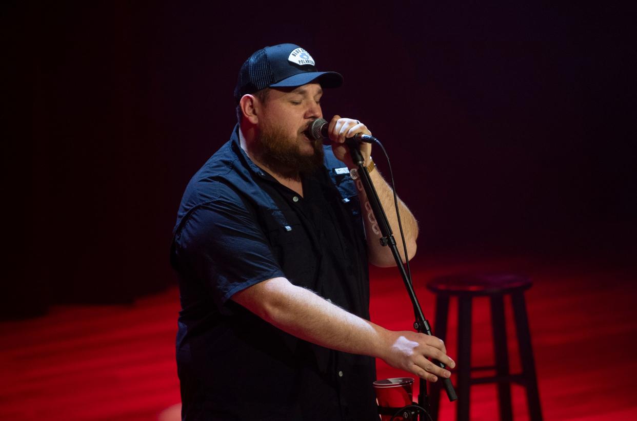 Luke Combs performs during the "Living Lucky With Luke Combs" performance at the Ryman Auditorium in Nashville, Tenn., Tuesday, Feb. 6, 2024. The performance was part of a multi-state lottery experience which was created via collaboration between ECE, Atlas Experiences, and Luke Combs.