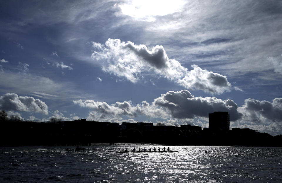 The Cambridge Men's team during a training session on the River Thames in Putney, London, Wednesday March 27, 2024. Jumping into London’s River Thames has been the customary celebration for members of the winning crew in the annual Boat Race between storied English universities Oxford and Cambridge. Now researchers say it comes with a health warning. (Zac Goodwin/PA via AP)