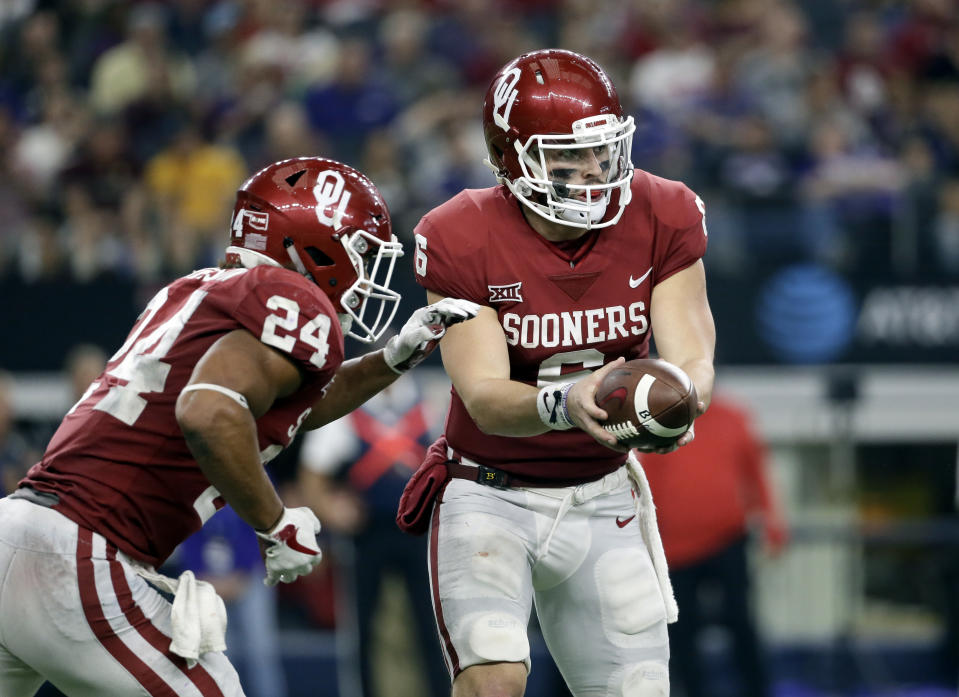 Oklahoma running back Rodney Anderson (L) is Oklahoma’s leading rusher. (AP Photo/Tony Gutierrez)