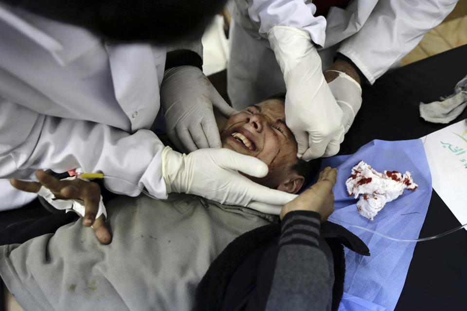 Injured boy is treated by doctors