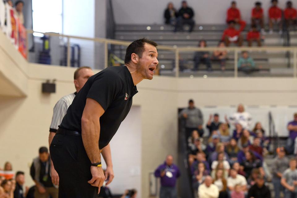 Murphy head coach Ray Gutierrez yells to players on the court during the NCHSAA 1A West regional final game at Catawba Valley Community College on March 7, 2020. 