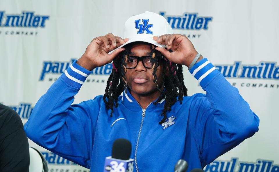 Jasper Johnson, a Lexington native and one of the top basketball players in the 2025 high school class, announces his commitment to the University of Kentucky during a ceremony at the Woodford County High School in Versailles, Ky. on Sep. 5, 2024.