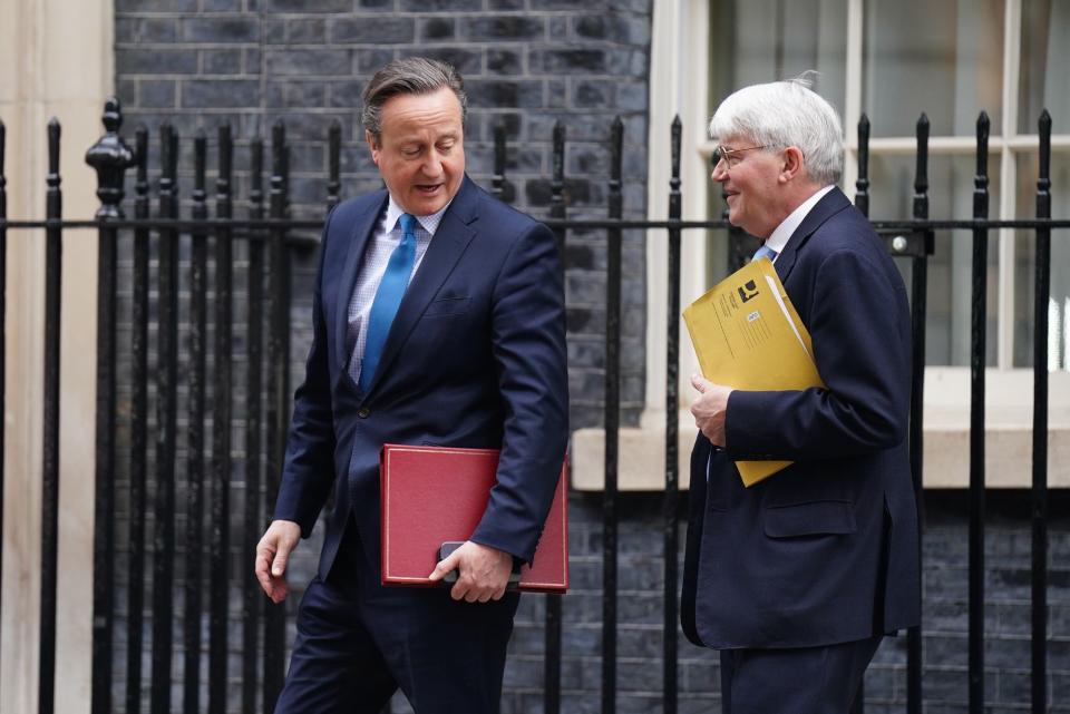 Foreign Secretary Lord David Cameron (left) and Andrew Mitchell, Minister of State for Development and Africa (James Manning/PA Wire)