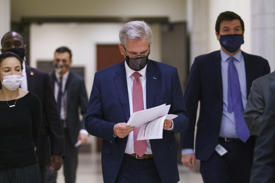 House Minority Leader Kevin McCarthy, R-Calif., arrives for his weekly news conference where he criticized Democrats on immigration policy, at the Capitol in Washington, Thursday, March 18, 2021. He also said that Rep. Eric Swalwell, D-Calif., should be removed from the House Intelligence Committee. (AP Photo/J. Scott Applewhite)