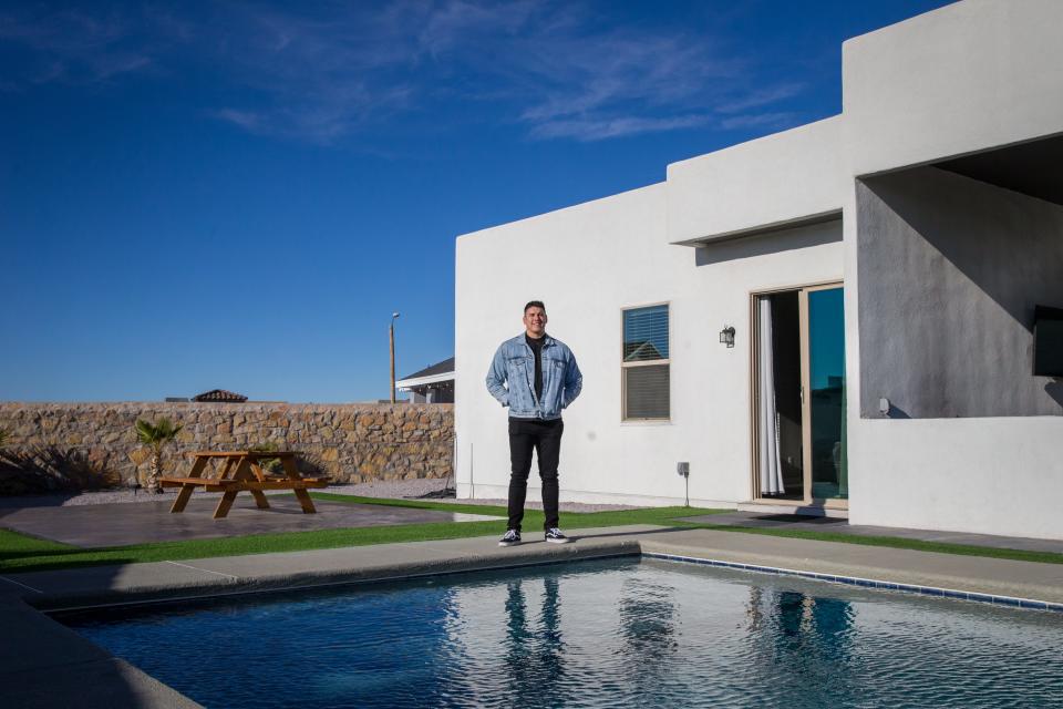 El Paso real estate agent Fernie Sanchez at his West Side home, dubbed the "Miami Style Pool House" on Airbnb, on Dec. 15, 2021.