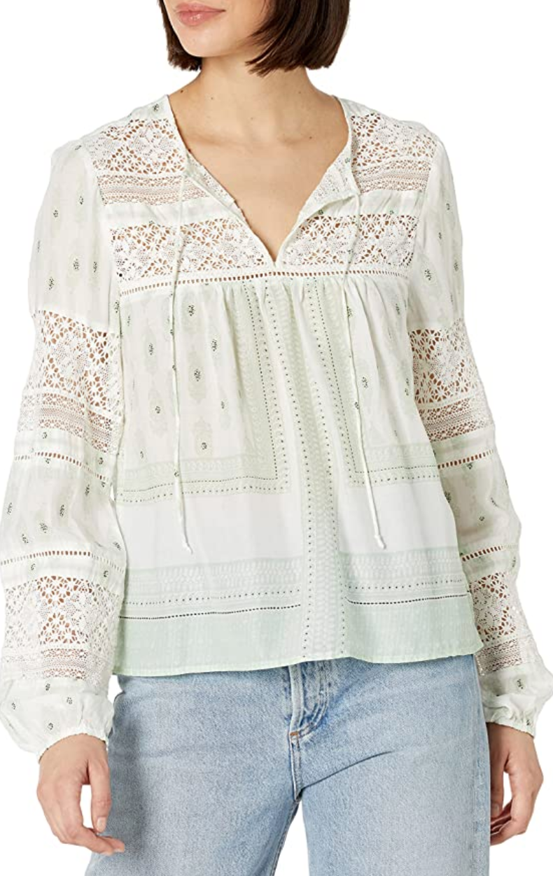 <p><strong>Lucky Brand</strong></p><p>amazon.com</p><p><a href="https://www.amazon.com/dp/B08SHMNF99?tag=syn-yahoo-20&ascsubtag=%5Bartid%7C10049.g.38255595%5Bsrc%7Cyahoo-us" rel="nofollow noopener" target="_blank" data-ylk="slk:Shop Now;elm:context_link;itc:0;sec:content-canvas" class="link ">Shop Now</a></p><p><strong><del>$79.50</del> $49.30 (38% off)</strong></p><p>If you want to give your sweaters a break, add a few blouses to your cart. We have total heart eyes for this lacey number.</p>