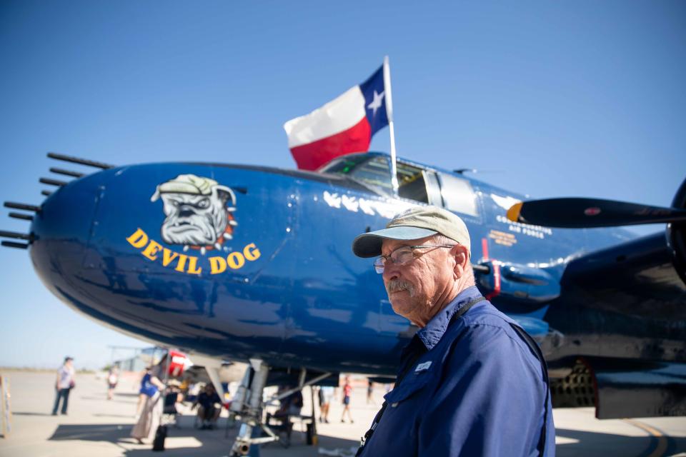 Robert Chalmers stands beside his restored Devil Dog during the Legacy of Liberty Air Show at Holloman Air Force Base on Saturday, May 7, 2022.
