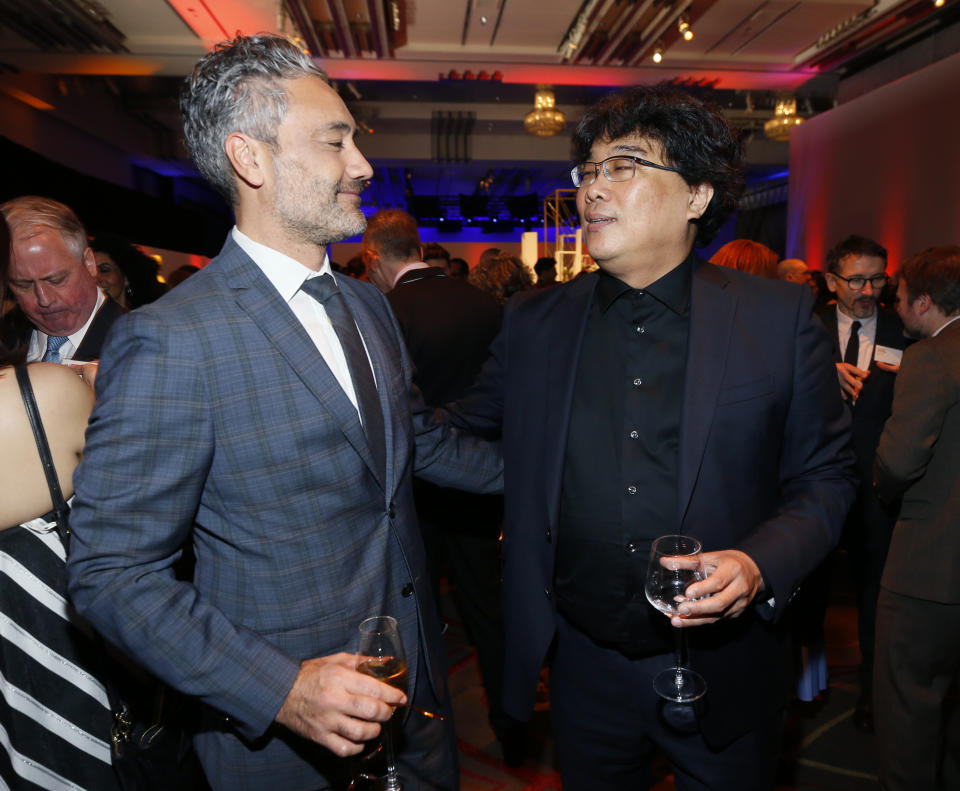 Taika Waititi, left, and Bong Joon-ho attend the 92nd Academy Awards Nominees Luncheon at the Loews Hotel on Monday, Jan. 27, 2020, in Los Angeles. (Photo by Danny Moloshok/Invision/AP)