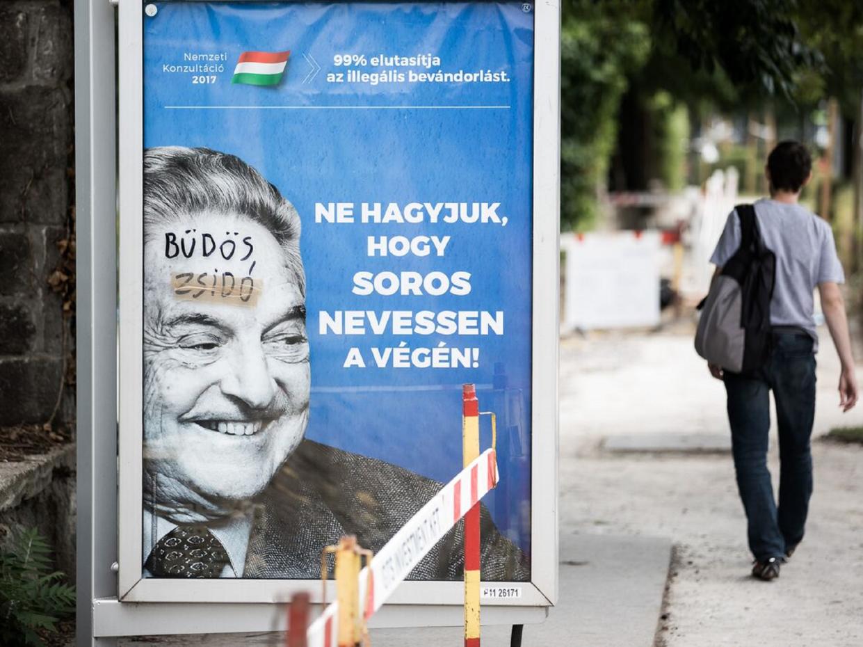 Billboards with images of George Soros have been defaced with graffiti that reads 'stinking Jew': Akos Stiller