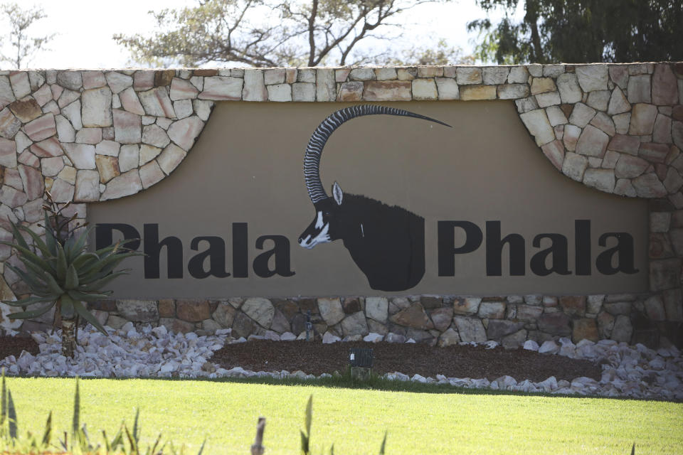 FILE - The entrance to the wildlife Ranch of South African President Cyril Ramaphosa, Phala Phala Wildlife Farm in Bela Bela, South Africa, June 3, 2022. Ramaphosa is fighting for his political future in a dramatic reversal of fortunes for an anti-apartheid icon once admired for tackling the problems of Africa's most developed economy. (AP Photo/File)