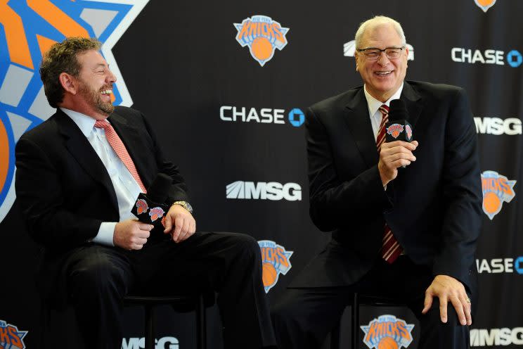 Phil Jackson shoots the breeze with bluesman James Dolan (Maddie Meyer/Getty Images).