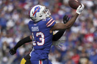 Buffalo Bills wide receiver Gabe Davis (13) catches a touchdown pass from quarterback Josh Allen with Pittsburgh Steelers safety Minkah Fitzpatrick, rear, defending during the first half of an NFL football game in Orchard Park, N.Y., Sunday, Oct. 9, 2022. (AP Photo/Joshua Bessex)