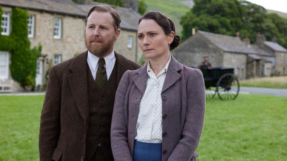 Samuel West as Siegfried Farnon and Anna Madeley as Mrs Hall in All Creatures Great and Small 