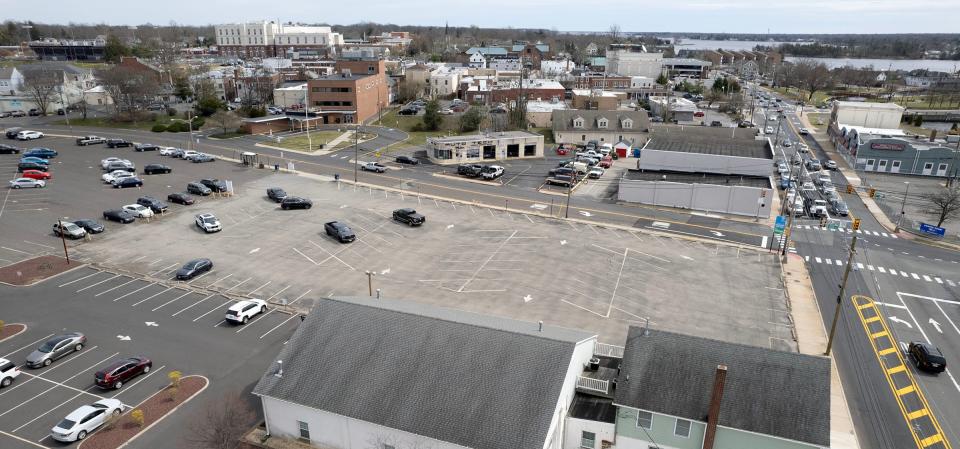 A four-story building with 64 residential units and commercial space on the first floor has been proposed to replace this parking lot at West Water and Irons Streets in Toms River shown Friday, March 15, 2024.