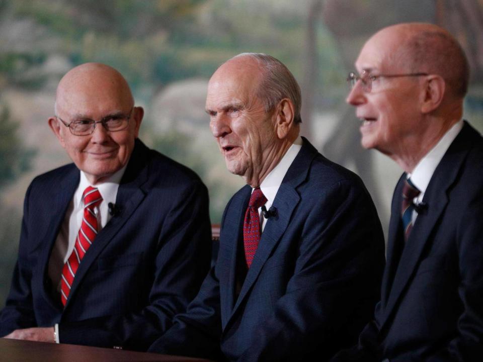 Russell M Nelson (C), the new president of the Mormon church, with his First Counsellor, Dallin H Oaks (L), and his Second Counsellor, Henry B Eyring (R), answer questions from the press (George Frey/Getty Images)