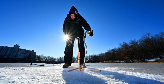 Frozen fish: Ice fishing no easy feat in subzero conditions on Worcester's  Bell Pond