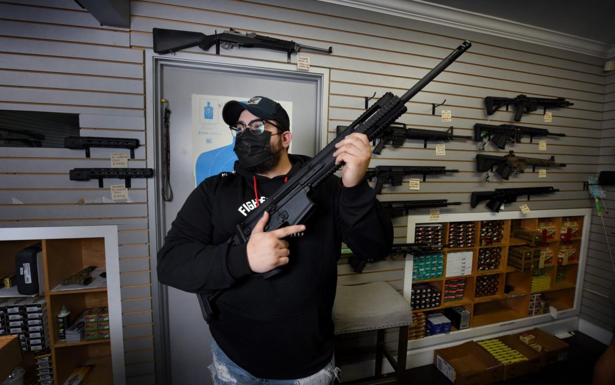 For gun salesmen like Issac Rodriguez, business is booming  - Jeff Rayner/Coleman-Rayner