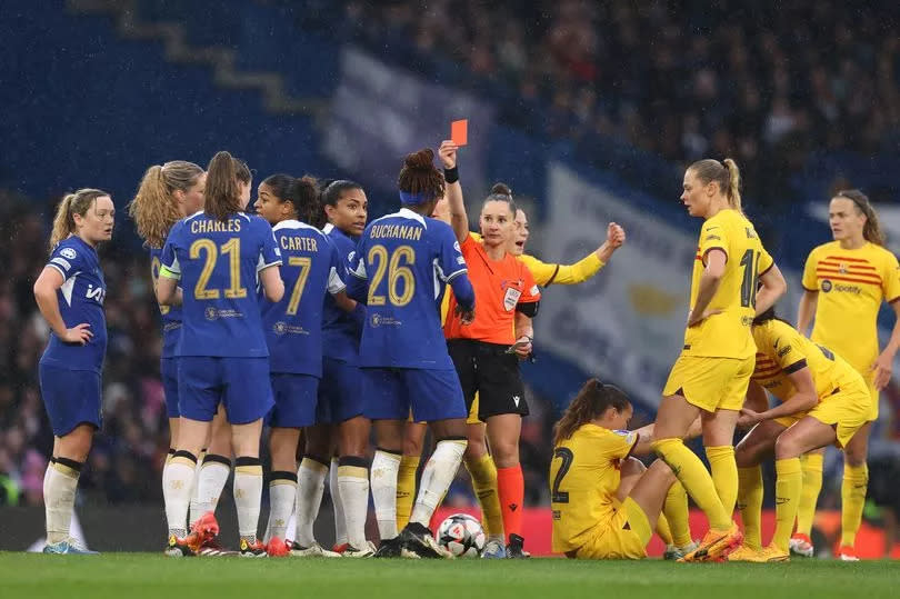 Kadeisha Buchanan is shown a red card