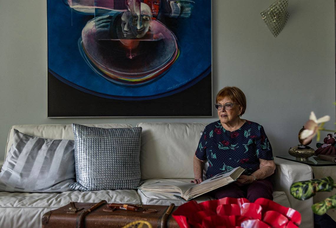Evelyn Walg Grunberg poses in her apartment in Aventura. This summer she will gather in France with other family membersto commemorate their family’s escape from Nazi Europe in 1942