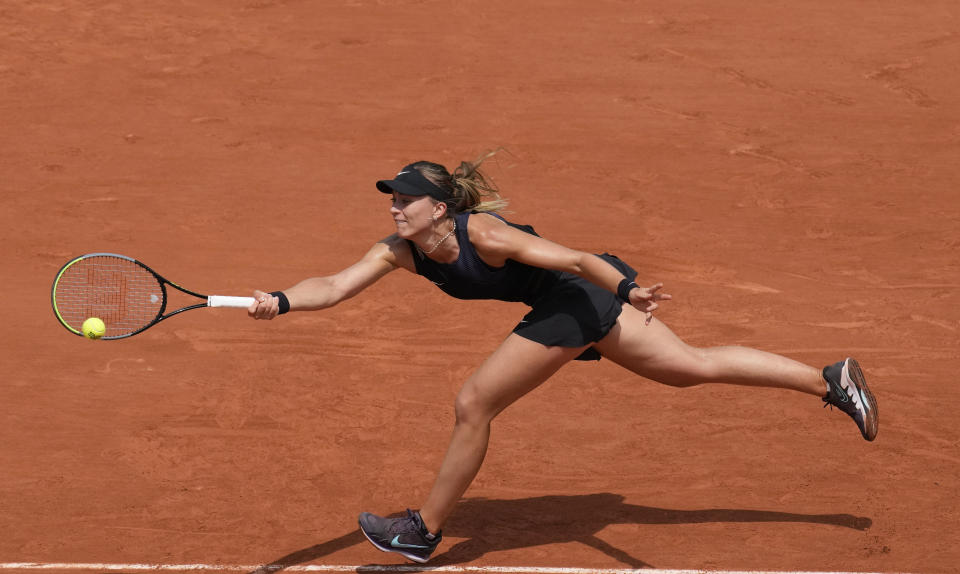 Spain's Paula Badosa plays a return to Czech Republic's Marketa Vondrousova during their fourth round match on day 8, of the French Open tennis tournament at Roland Garros in Paris, France, Sunday, June 6, 2021. (AP Photo/Christophe Ena)