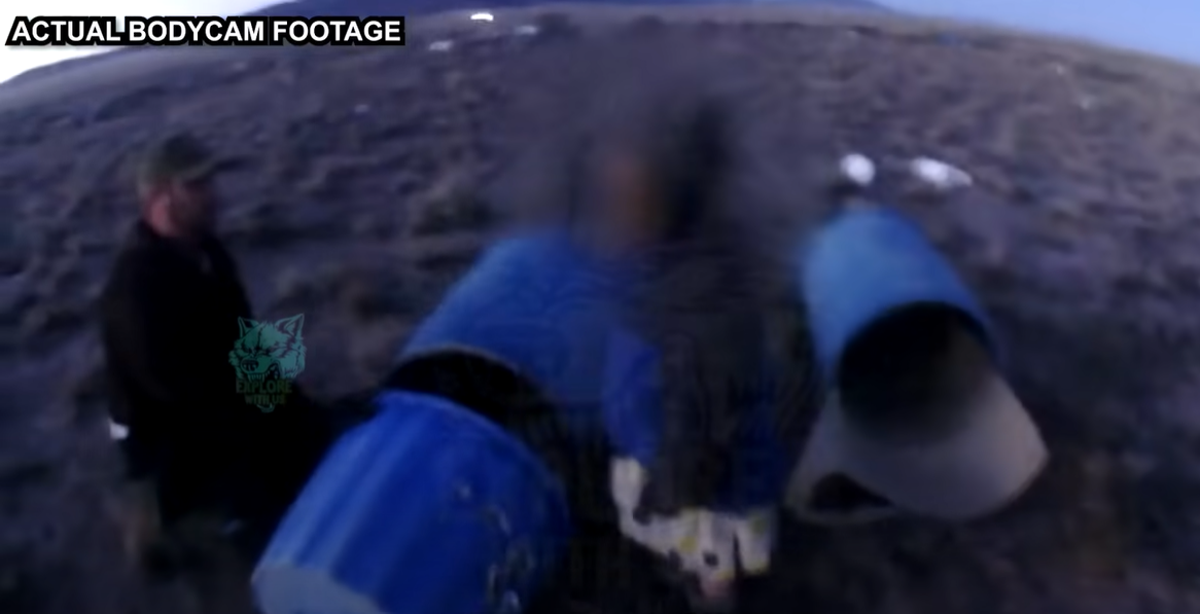 The footage shows police finding the girls inside barrels in subfreezing temperatures (Explore With Us/ YouTube)
