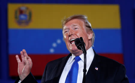 U.S. President Donald Trump speaks about the crisis in Venezuela during a visit to Florida International University in Miami, Florida, U.S., February 18, 2019. REUTERS/Kevin Lamarque