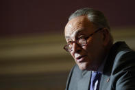 Senate Minority Leader Sen. Chuck Schumer of N.Y., speaks to reporters on Capitol Hill in Washington, Wednesday, Dec. 30, 2020, before his meeting with Transportation Secretary-designate Pete Buttigieg. (AP Photo/Susan Walsh)