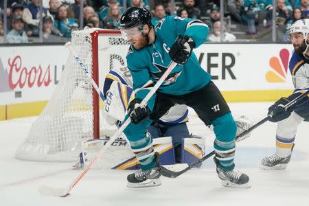 May 19, 2019; San Jose, CA, USA; San Jose Sharks center Joe Pavelski (8) controls the puck against the St. Louis Blues during the second period in Game 5 of the Western Conference Final of the 2019 Stanley Cup Playoffs at SAP Center at San Jose. Mandatory Credit: Stan Szeto-USA TODAY Sports