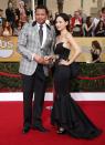Actor Terence Howard and wife Micheele Ghent arrive at the 20th annual Screen Actors Guild Awards in Los Angeles, California January 18, 2014. REUTERS/Lucy Nicholson (UNITED STATES Tags: ENTERTAINMENT)(SAGAWARDS-ARRIVALS)