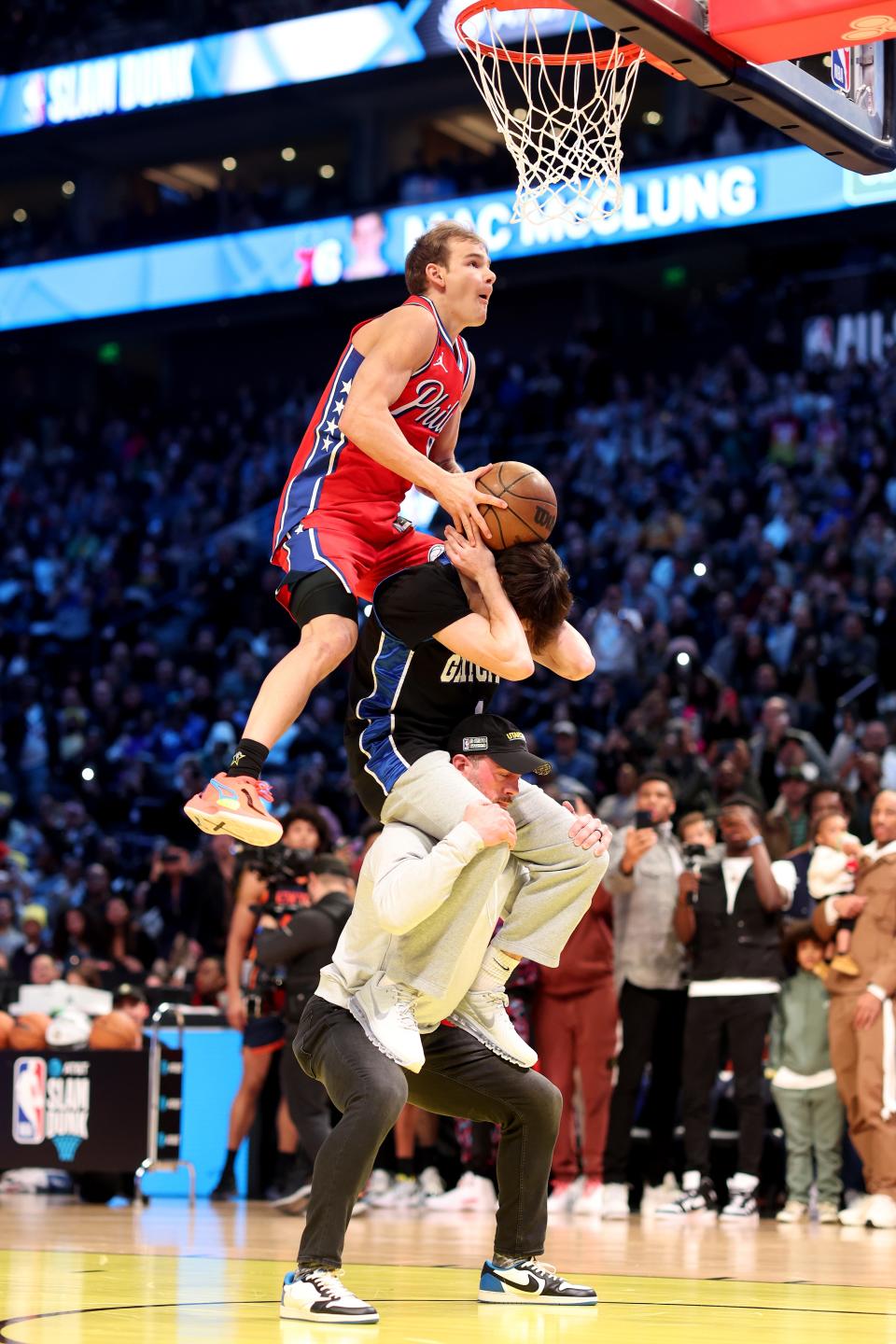 Mac McClung #9 of the Philadelphia 76ers dunks the ball in the 2023 NBA All Star AT&T Slam Dunk Contest at Vivint Arena on February 18, 2023 in Salt Lake City, Utah.