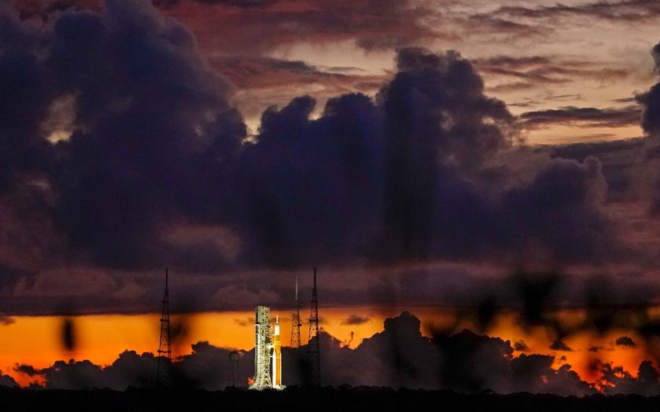 Approaching sunrise at the Kennedy Space Center in Florida  - Brynn Anderson /AP