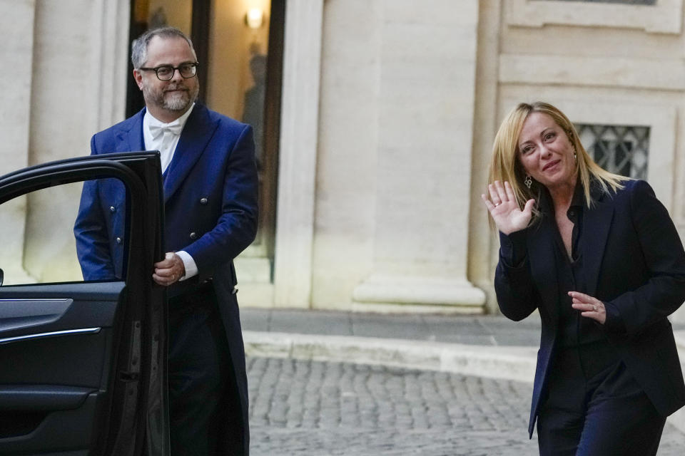 Brothers of Italy's leader Giorgia Meloni leaves Rome's Quirinale Presidential Palace after she accepted to be the to be the Prime Minister of the new Italian government and presented the list of the ministers to Italian President Sergio Mattarella, in Rome, Friday, Oct. 21, 2022. (AP Photo/Alessandra Tarantino)