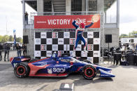 Chip Ganassi Racing driver Alex Palou (10) celebrates on Victory Lane after winning the Honda Indy Grand Prix of Alabama auto race at Barber Motorsports Parkway, Sunday, April 18, 2021, in Birmingham, Ala. (AP Photo/Vasha Hunt)