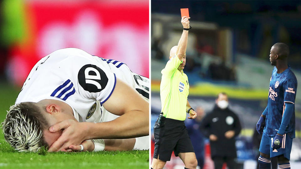 Arsenal's Nicolas Pepe (pictured right) shown a red card and Leeds United's midfielder Ezgjan Alioski (pictured left) in agony on the ground.