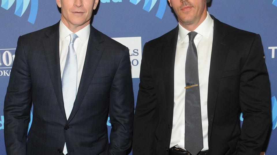 Anderson Cooper (L) and Benjamin Maisani attend the VIP Red Carpet Suite hosted by Ketel One Vodka at the 26th Annual GLAAD Media Awards in New York on May 9, 2015 in New York City