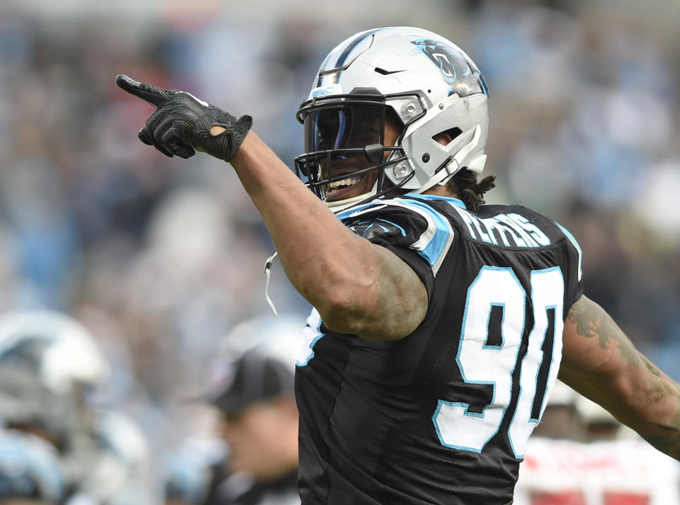 Here’s looking at you: Carolina pass-rusher Julius Peppers announced on Friday that he’s retiring after 17 seasons. (AP)