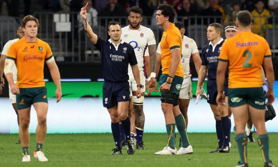 Australia’s Darcy Swain is shown a a red card by James Doleman