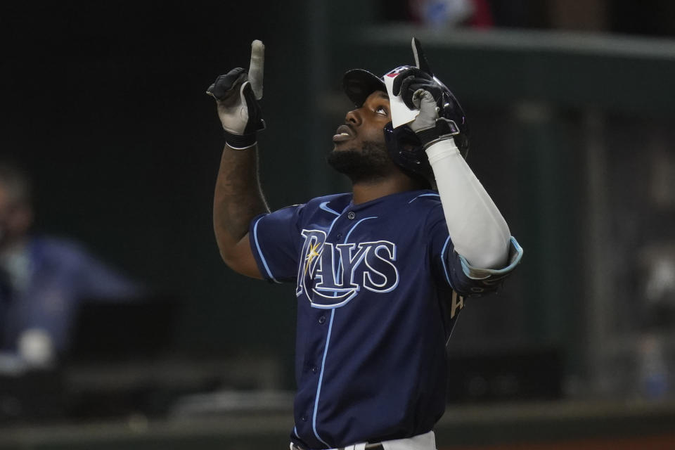 Tampa Bay Rays' Randy Arozarena celebrates after a home run against the Los Angeles Dodgers during the fourth inning in Game 4 of the baseball World Series Saturday, Oct. 24, 2020, in Arlington, Texas. (AP Photo/Eric Gay)