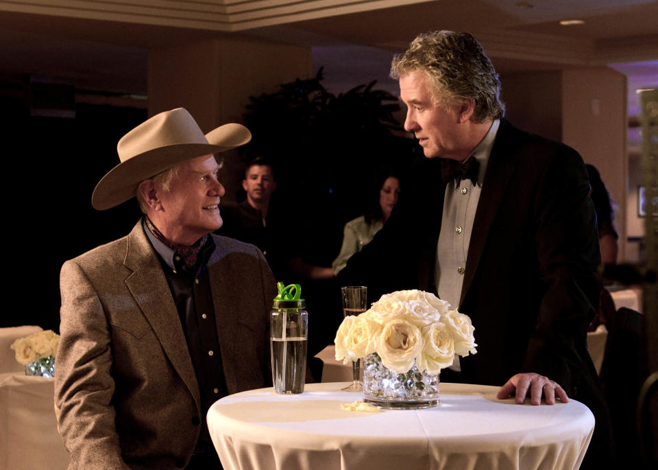 This publicity image released by TNT shows Larry Hagman as J.R. Ewing, left, and Patrick Duffy as Bobby Ewing in a scene from "Dallas," premiering Wednesday June 13, at 9:00 p.m. EST on TNT. (AP Photo/TNT, Zade Rosenthal)
