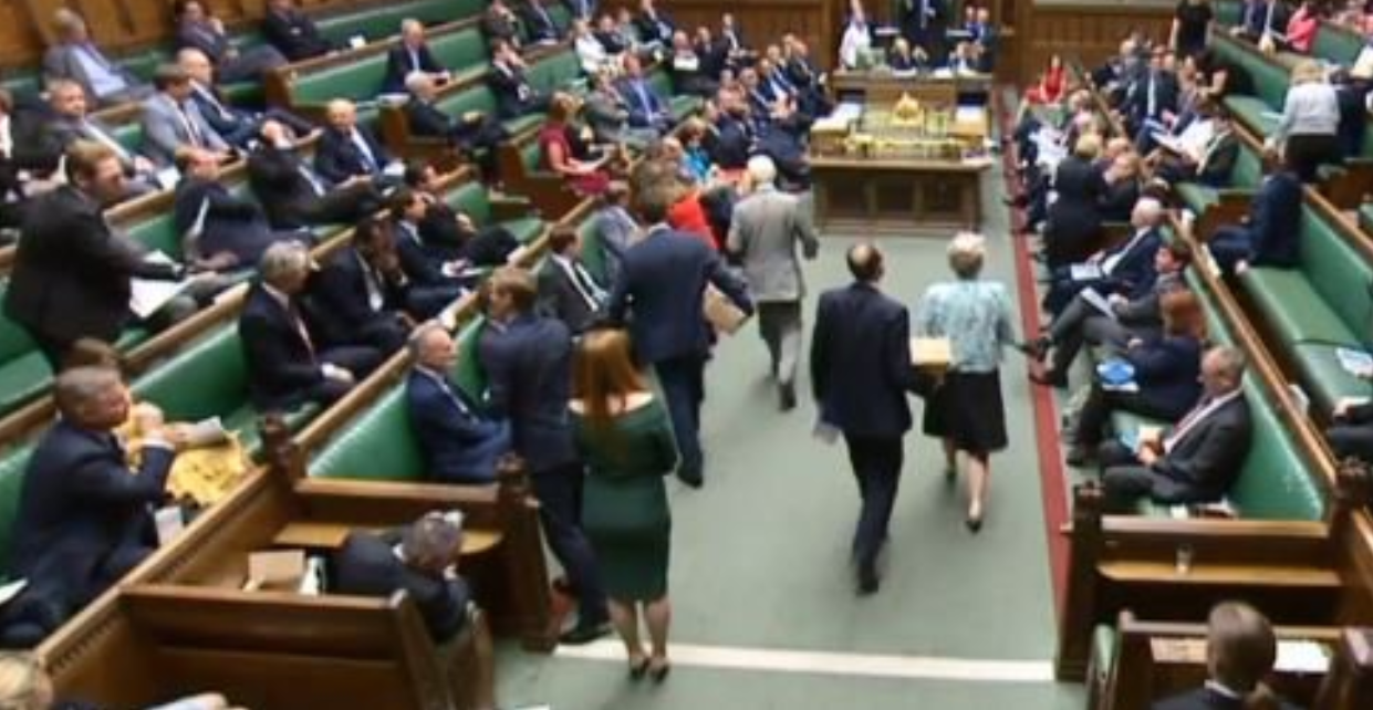 Chaos: MPs rush to hand out the White Paper in the Commons