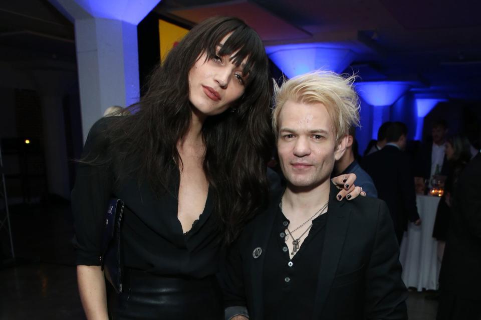 <p>Phillip Faraone/Getty</p> Ariana Cooper and Deryck Whibley