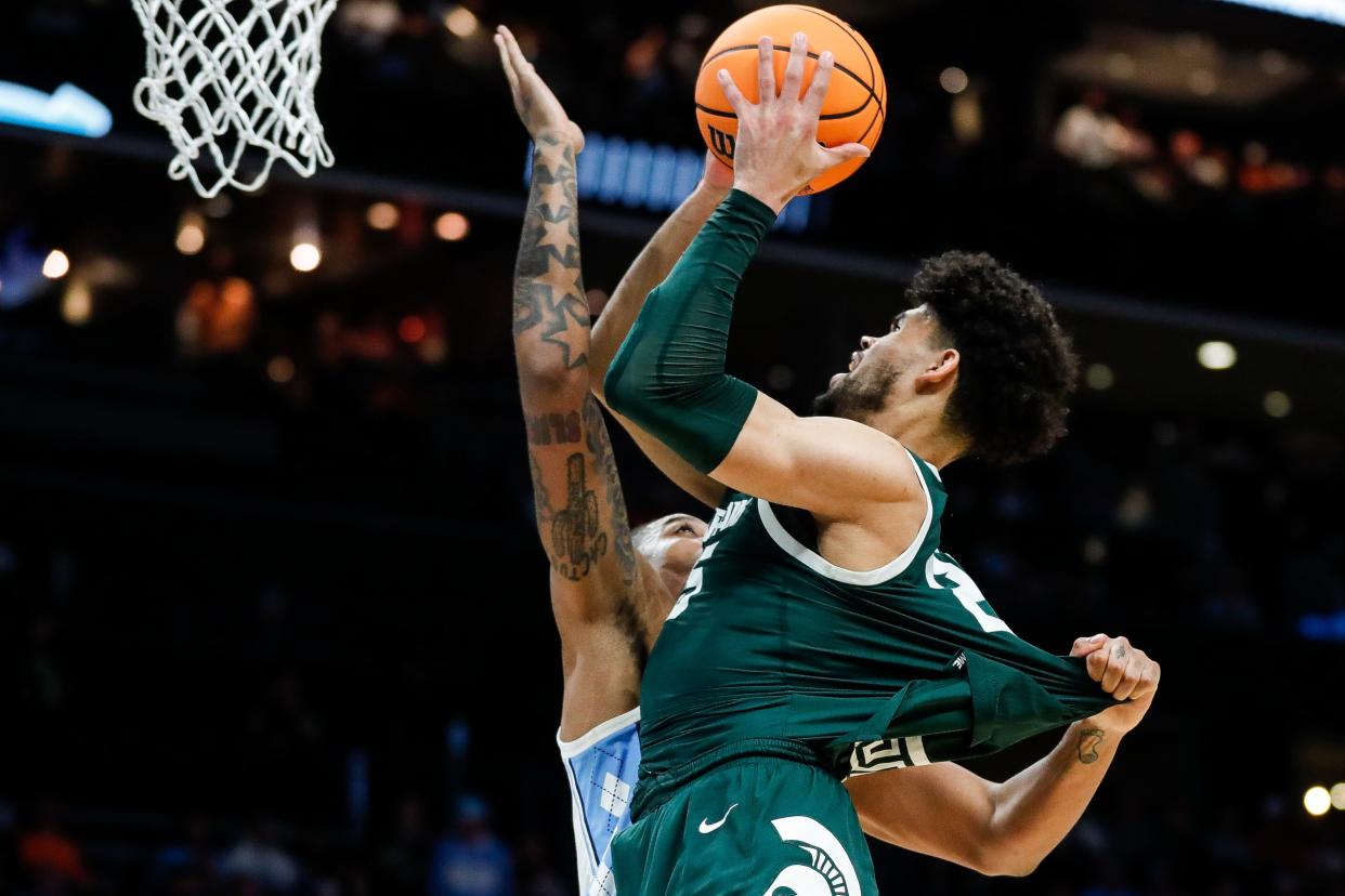 Michigan State forward Malik Hall (25) is defended by North Carolina forward Armando Bacot (5) during the second half of the NCAA tournament West Region second round at Spectrum Center in Charlotte, N.C. on Saturday, March 23, 2024.