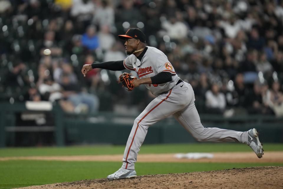 Baltimore Orioles relief pitcher Yennier Cano throws during the eighth inning of a baseball game against the Chicago White Sox, Friday, April 14, 2023, in Chicago. (AP Photo/Erin Hooley)