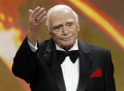 Lifetime achievement honoree Ernest Borgnine waves after receiving his award at the 17th annual Screen Actors Guild Awards in Los Angeles, California, January 30, 2011. REUTERS/Mario Anzuoni (UNITED STATES - Tags: ENTERTAINMENT IMAGES OF THE DAY) (SAGAWARDS-SHOW)