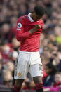 Manchester United's Marcus Rashford leaves the pitch during the English Premier League soccer match between Manchester United and Everton, at the Old Trafford stadium in Manchester, England, Saturday, April 8, 2023. (AP Photo/Dave Thompson)