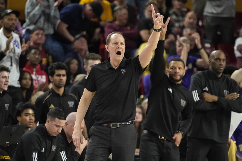 Washington coach Mike Hopkins calls out a play against Arizona State during the second half of an NCAA college basketball game Thursday, Feb. 22, 2024, in Tempe, Ariz. (AP Photo/Darryl Webb)