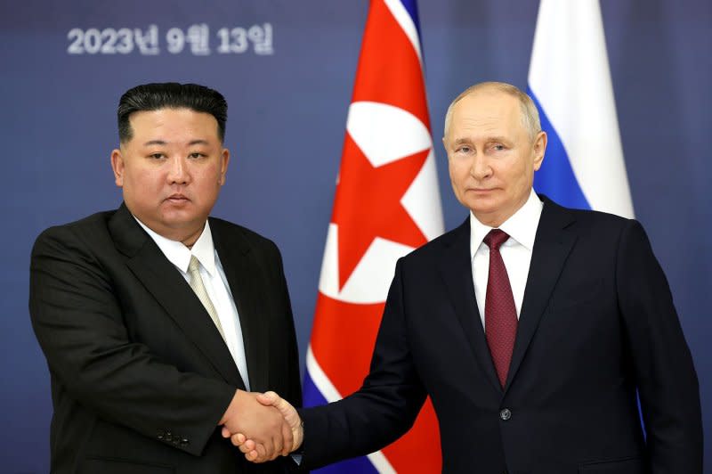 North Korean leader Kim Jong Un (L) received the gift of a car from Russian President Vladimir Putin (R), state-run Korean Central News Agency reported Tuesday. File Photo by Kremlin Pool/UPI